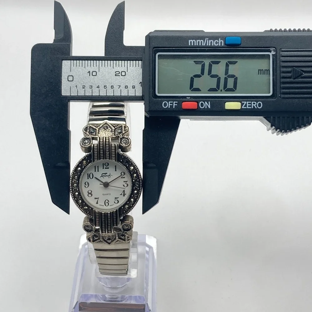 Vtg Faberge Womens Marcasite Watch 26mm Silver Tone Stretch Band New Battery